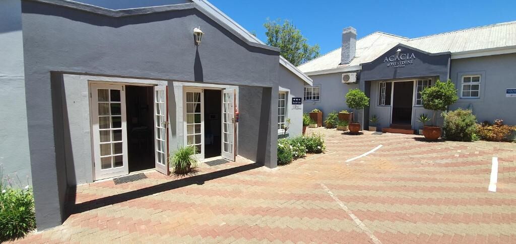 Acacia Westdene B&B courtyard and private room entrances